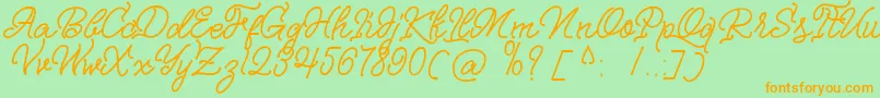 Nagata Script Font – Orange Fonts on Green Background