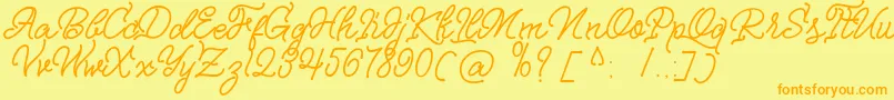 Nagata Script Font – Orange Fonts on Yellow Background