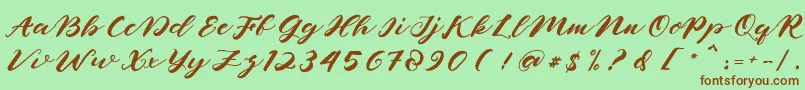 naghita Font – Brown Fonts on Green Background