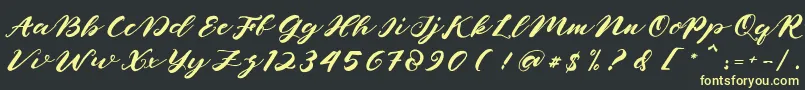 naghita Font – Yellow Fonts on Black Background