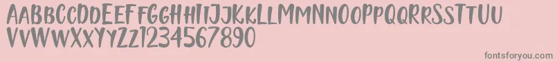 Naishila Caps Font – Gray Fonts on Pink Background