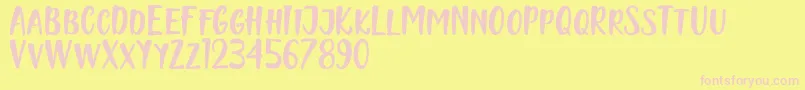 Naishila Caps Font – Pink Fonts on Yellow Background