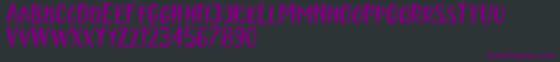 Naishila Caps Font – Purple Fonts on Black Background