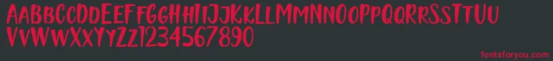 Naishila Caps Font – Red Fonts on Black Background