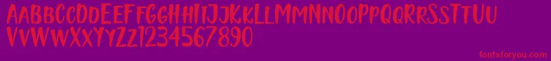 Naishila Caps Font – Red Fonts on Purple Background