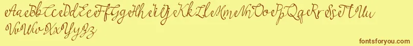 najwa Font – Brown Fonts on Yellow Background