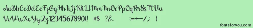 フォントnalytha – 緑の背景に黒い文字