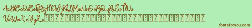 Namasia  Personal Use-Schriftart – Braune Schriften auf grünem Hintergrund