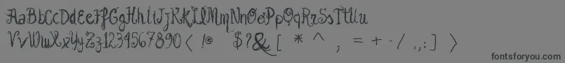 フォントVtksgarotabonita – 黒い文字の灰色の背景