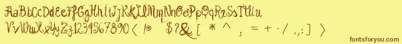 Vtksgarotabonita Font – Brown Fonts on Yellow Background