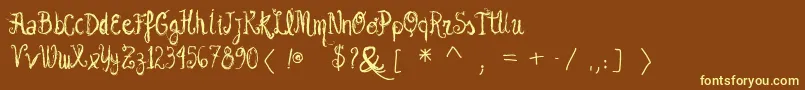 Vtksgarotabonita-Schriftart – Gelbe Schriften auf braunem Hintergrund