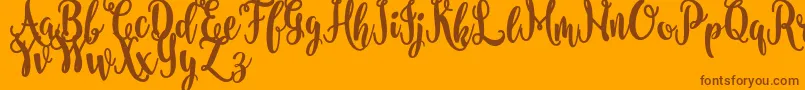 nanda FREE Font – Brown Fonts on Orange Background