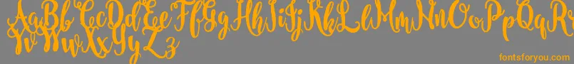nanda FREE Font – Orange Fonts on Gray Background