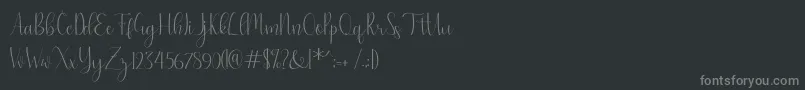 natasa Font – Gray Fonts on Black Background