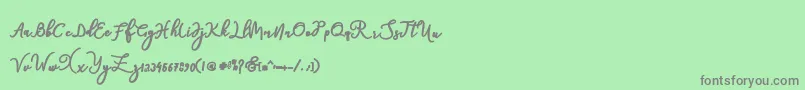 natasha Font – Gray Fonts on Green Background