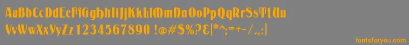 フォントPetrarka – オレンジの文字は灰色の背景にあります。