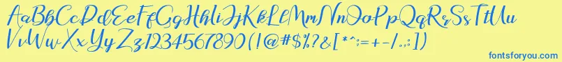 natasya Font – Blue Fonts on Yellow Background