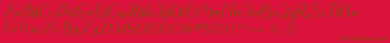 natasya Font – Brown Fonts on Red Background