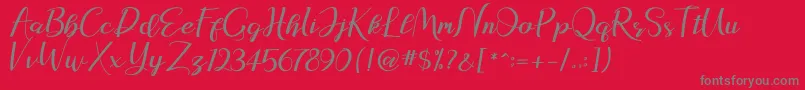 natasya Font – Gray Fonts on Red Background