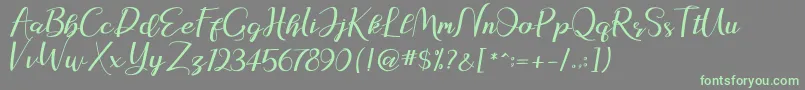 natasya Font – Green Fonts on Gray Background