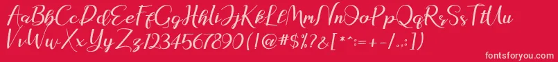 natasya Font – Pink Fonts on Red Background