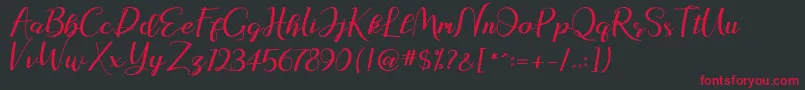 natasya Font – Red Fonts on Black Background
