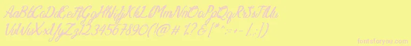 Nathasya-Schriftart – Rosa Schriften auf gelbem Hintergrund