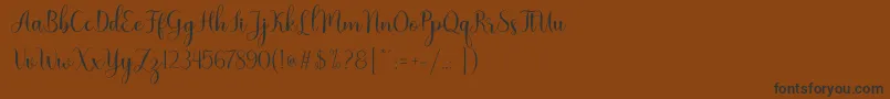 Nattalia Font – Black Fonts on Brown Background
