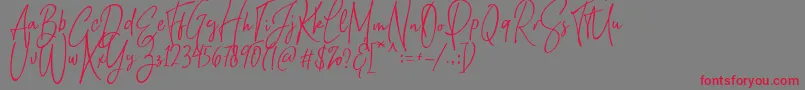 Natthalie Demo Font – Red Fonts on Gray Background