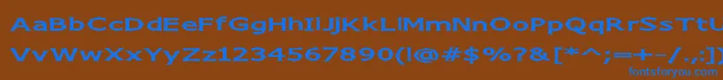 ChizzWide-Schriftart – Blaue Schriften auf braunem Hintergrund