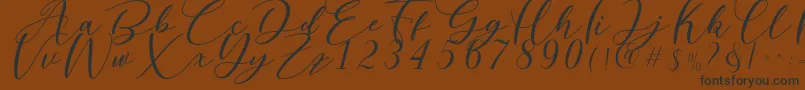 Nattyla Font – Black Fonts on Brown Background