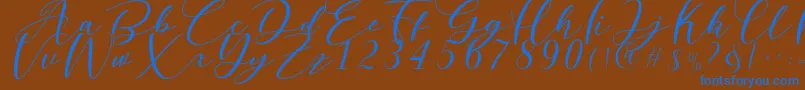 Nattyla Font – Blue Fonts on Brown Background