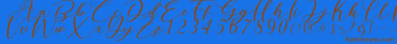 Nattyla Font – Brown Fonts on Blue Background