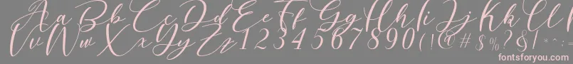 Nattyla-Schriftart – Rosa Schriften auf grauem Hintergrund