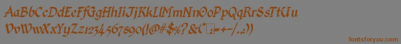 Fonte KingthingsCalligraphicaItalic – fontes marrons em um fundo cinza