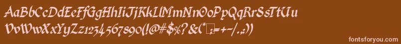 Fonte KingthingsCalligraphicaItalic – fontes rosa em um fundo marrom