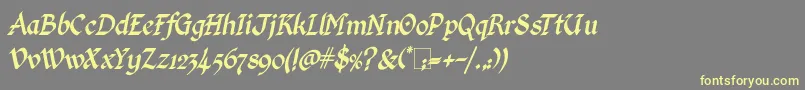 Шрифт KingthingsCalligraphicaItalic – жёлтые шрифты на сером фоне