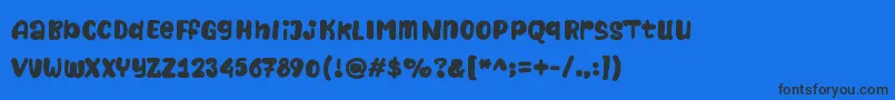 Naturalistic Playground Font – Black Fonts on Blue Background