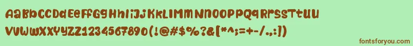 Naturalistic Playground Font – Brown Fonts on Green Background