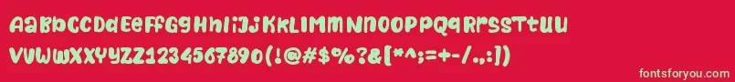 Naturalistic Playground Font – Green Fonts on Red Background
