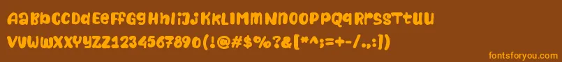 Naturalistic Playground Font – Orange Fonts on Brown Background