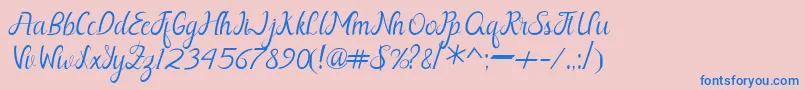 Nayla Free Font – Blue Fonts on Pink Background
