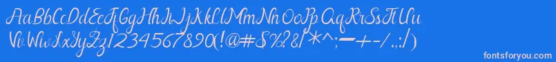 Nayla Free Font – Pink Fonts on Blue Background