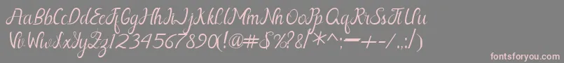 Шрифт Nayla Free – розовые шрифты на сером фоне