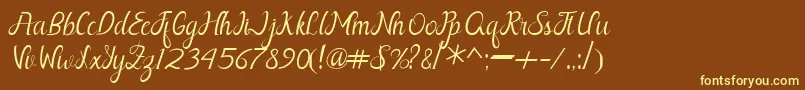 Шрифт Nayla Free – жёлтые шрифты на коричневом фоне