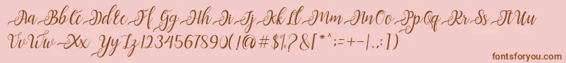 Nayla Script-Schriftart – Braune Schriften auf rosa Hintergrund