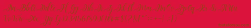 Fonte Nayla Script – fontes marrons em um fundo vermelho