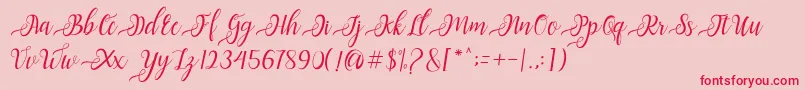 フォントNayla Script – ピンクの背景に赤い文字