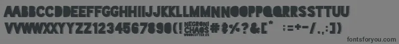 Negroni Chaos Font – Black Fonts on Gray Background