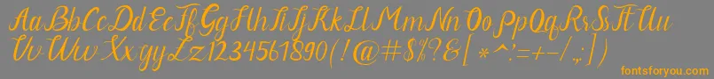 Neguhetty Font – Orange Fonts on Gray Background